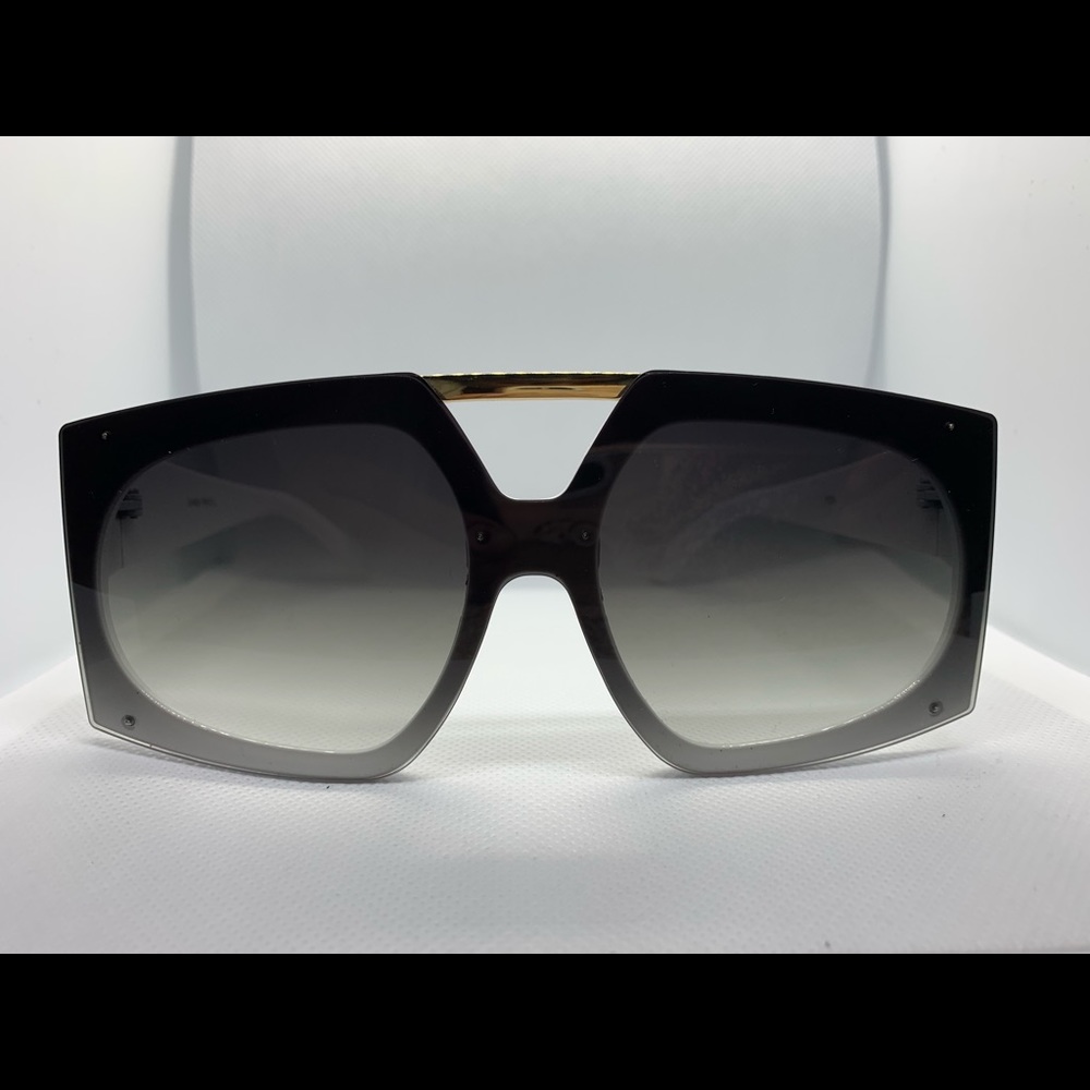 Large framed smoky lens sunglasses